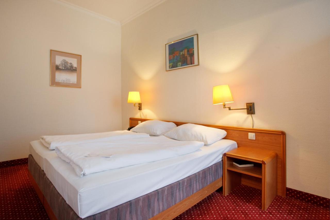 Acom-Hotel Berlin Kurfuerstendamm Berlim Quarto foto